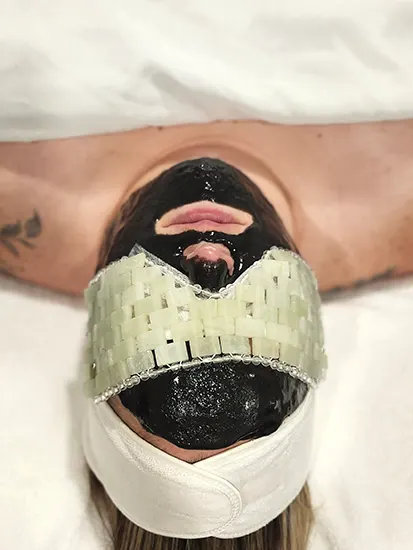 Facial with Charcoal mask and jade mask